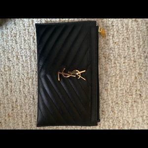 Saint Laurent Black Pouch. Everything included